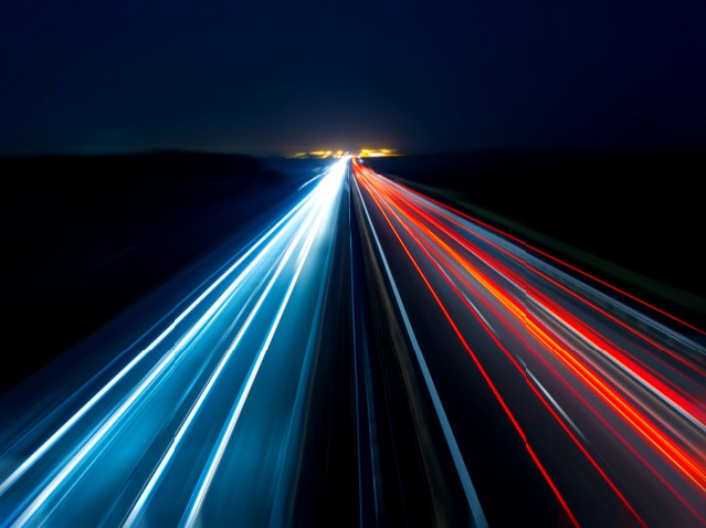 Blurry abstract photo of the lights of cars