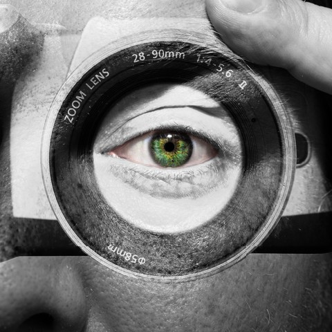 Camera painted on male face