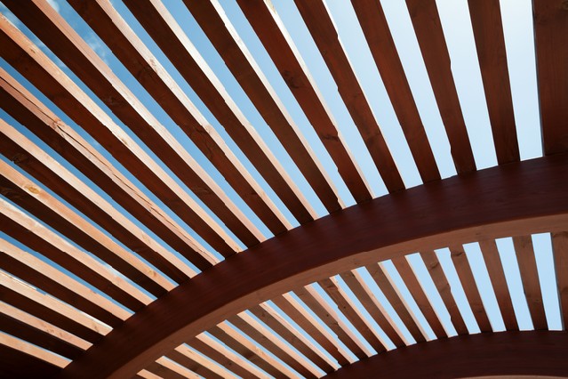 Modern architectural construction of wooden slats