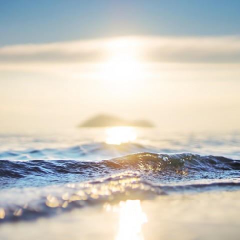 Beautiful sea wave and sky at sunset